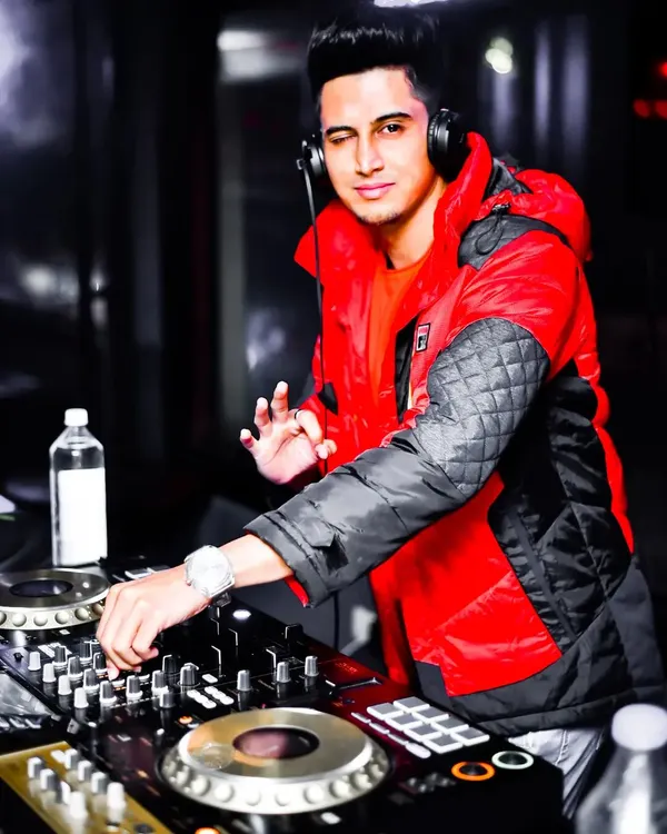 The energy during a live set is everything. My custom-produced tracks are designed to create these peak moments, mixing familiar Bollywood vocals with unexpected drops and beats.