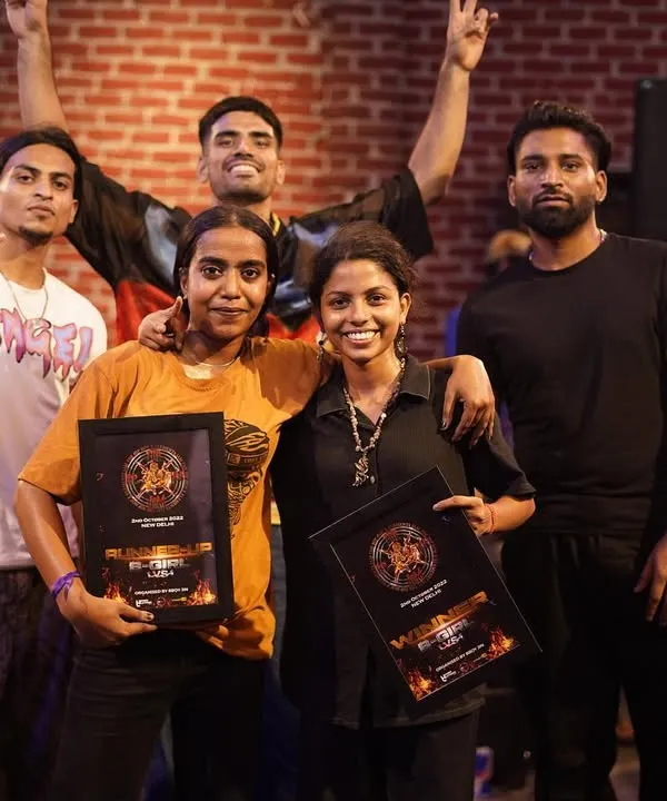 The winners of the B-girl battle at our Hiphop Elements Jam, posing with the judges. We celebrate the champions and create opportunities for female dancers to lead the scene.