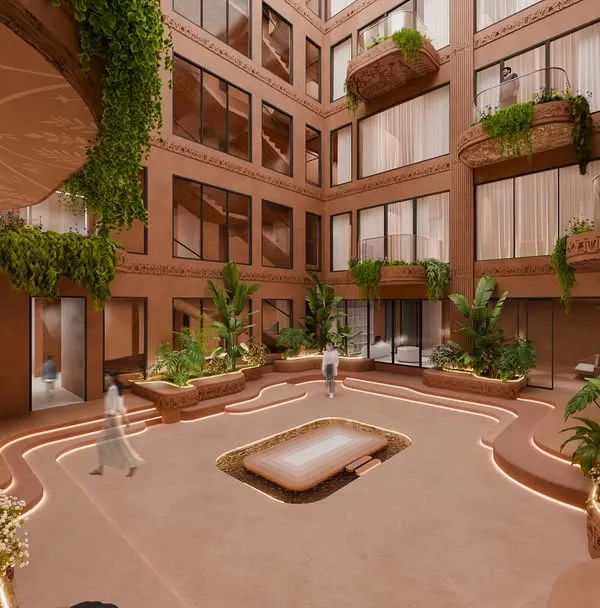 At the heart of our Tirupati wellness retreat is this grand courtyard, open to the sky. The terracotta walls, intricate Kalamkari detailing, and lush greenery create a living, breathing space that is serene and timeless.