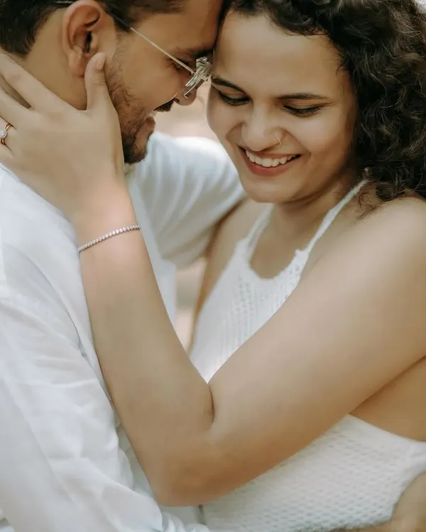 A close-up portrait filled with genuine smiles and affection. These are the unposed, heartfelt moments I strive to capture.