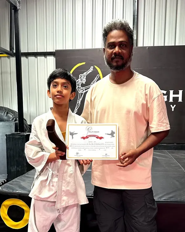 I am incredibly proud to present this student with his new belt and certificate after a successful Karate Belt Grading Exam. His hard work and dedication have paid off. Congratulations.