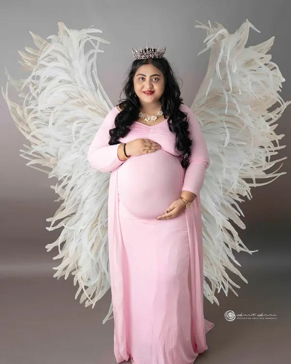 This is the magic of motherhood, captured in a single frame. I believe every mother is an angel, and with this portrait, we brought that feeling to life with ethereal wings and a soft, dreamy glow. It’s more than a photo; it’s a celebration of the strength and serenity you carry.