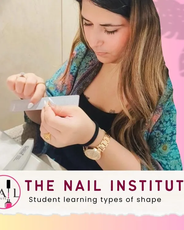 The perfect manicure starts with the perfect shape. Here, a student is learning how to file and shape nails, from almond to coffin.