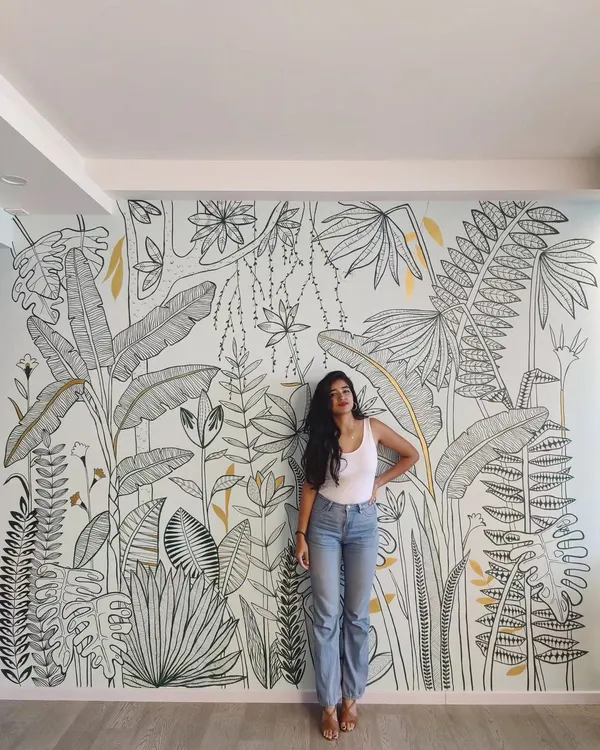 A full view of this black and white tropical mural, designed to make a statement. Standing next to the finished piece is always a grateful moment.