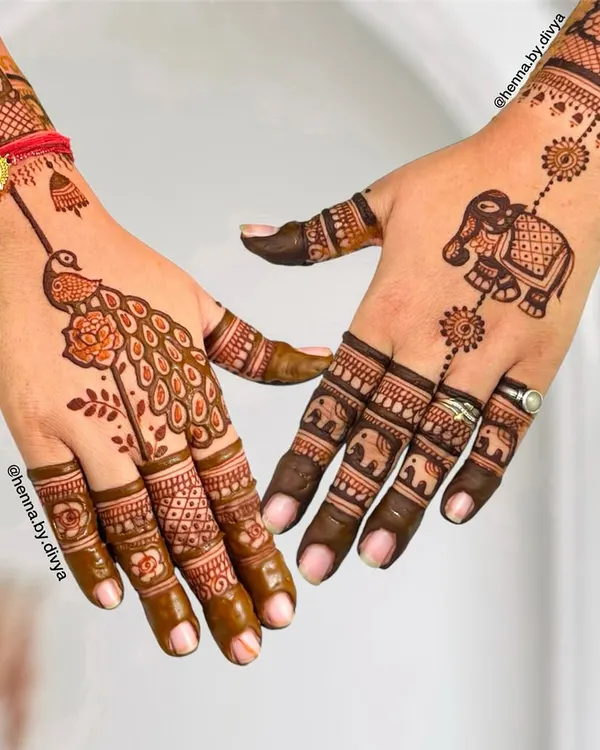 A beautiful example of party mehendi for the back of the hands. I created two distinct yet complementary designs, one featuring a classic peacock and the other a royal elephant, perfect for wedding guests who want unique, traditional art.