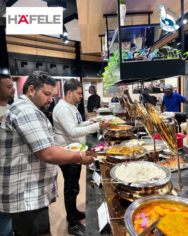 A full view of our grand buffet line at a Häfele India event, designed to impress architects, dealers, and investors with a wide variety of dishes.