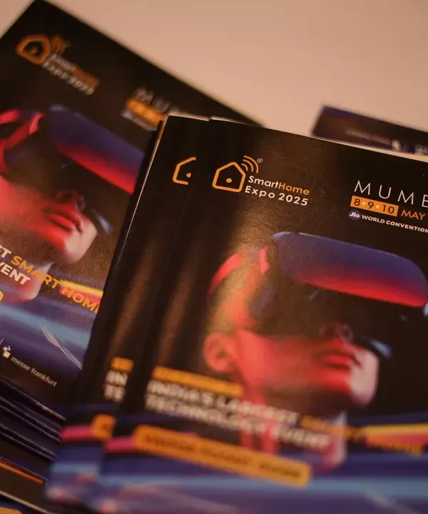 A stack of our Visitor Pocket Guides, ready for attendees. We ensure every visitor has the information they need to navigate India's largest smart technology event.