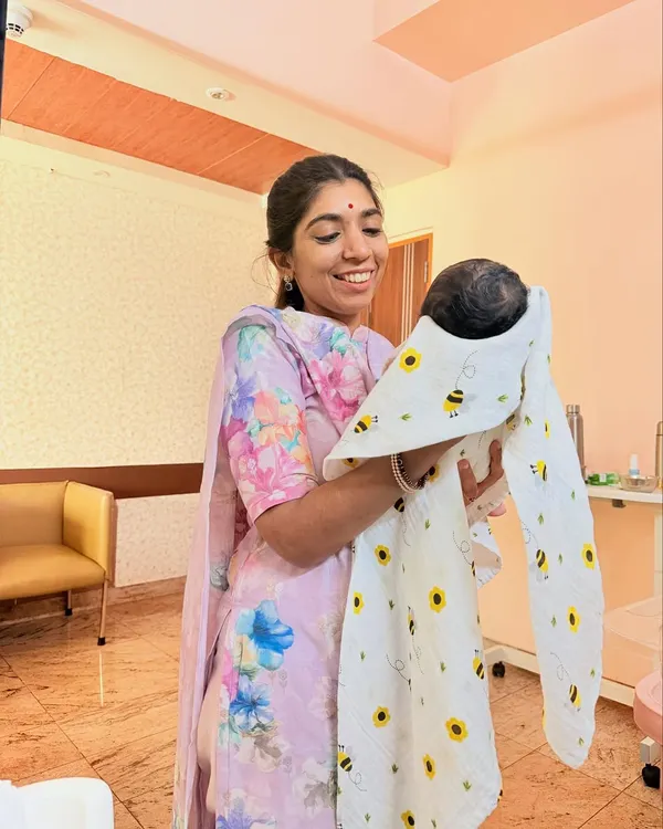 There is no greater joy than meeting a new baby and their strong mother. Here I am with Monisha, one of my students, and her little one. She was worried about having a vaginal birth due to gestational diabetes, but with dedicated exercises and her husband's support, she had an empowering birth experience. It’s moments like these that make my work so fulfilling.