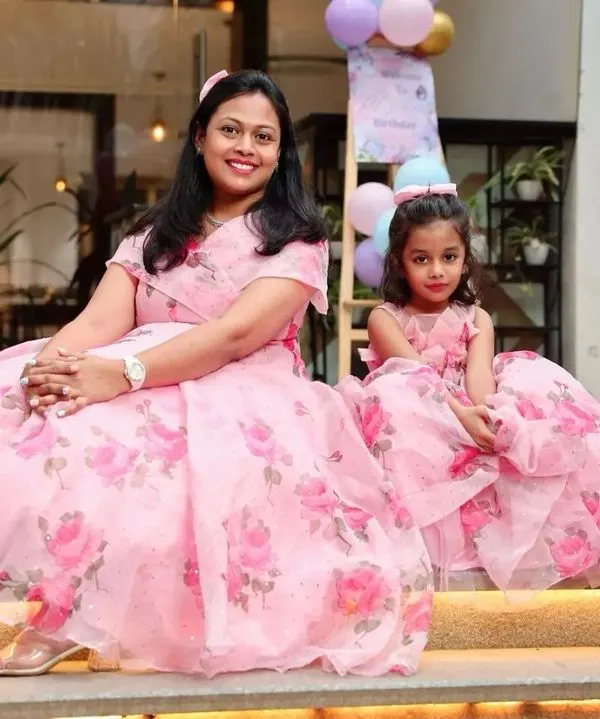 This is what I love to do. I created these matching floral organza gowns for a mother and her daughter to wear for a special celebration.