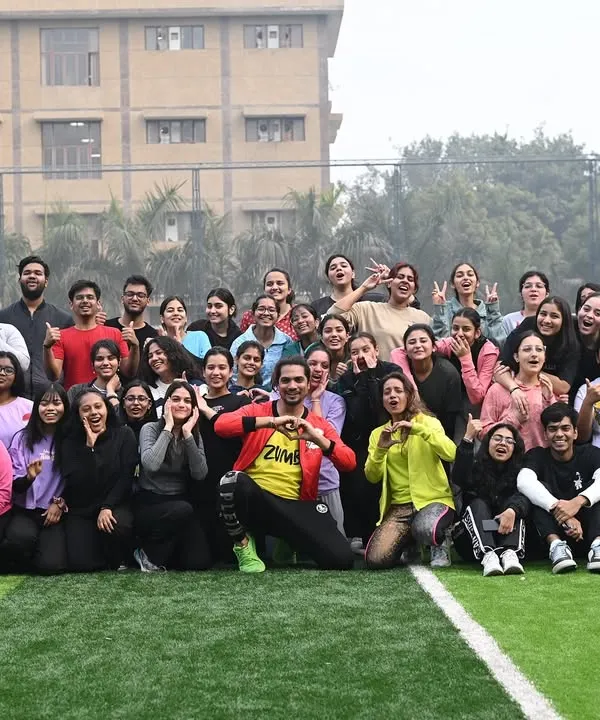 A large group photo capturing the happy and energized participants of our corporate Zumba event. This shows our ability to engage large crowds and create a positive, memorable experience for employees.