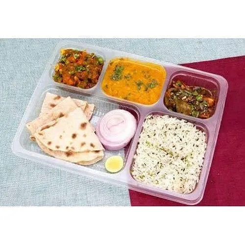 Your complete dinner or lunch, sorted. This is a typical thali we deliver, with everything you need for a satisfying and healthy meal. We focus on providing a hygienic and well-portioned tiffin.