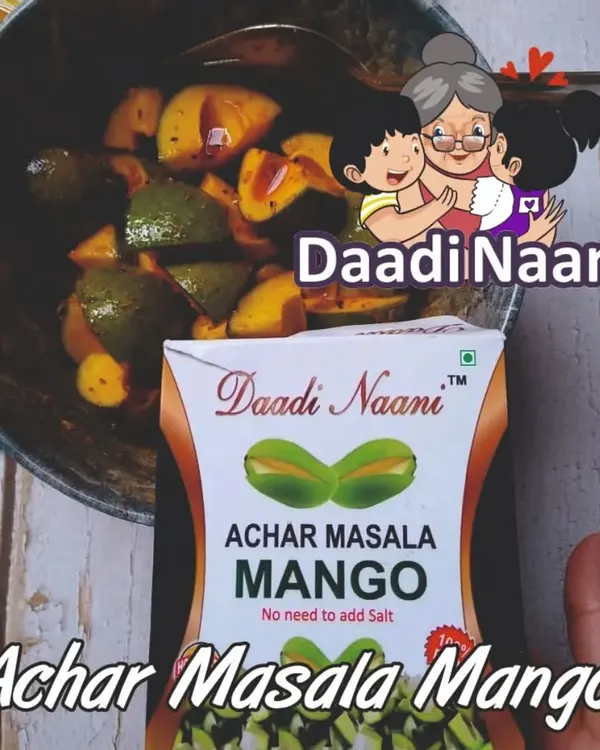 My Achar Masala Mango mix is the key to creating this beautiful, traditional mango pickle. The product packet is shown alongside the final, tempting result in a kadai.