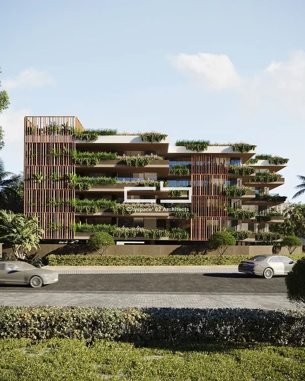 This residential design champions sustainability through green architecture, creating a fresh and vibrant living space. It incorporates wooden pergolas with lush greenery, promoting a healthy lifestyle while helping to control the micro-climate of the area.