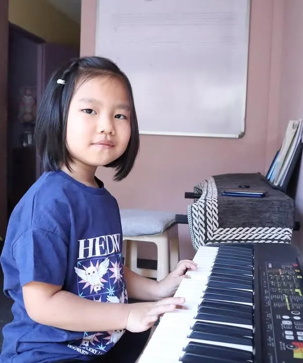 Faith's fingers dance across the keys, weaving magic and melody. We start our youngest students with fun exercises to build their confidence and love for the piano.
