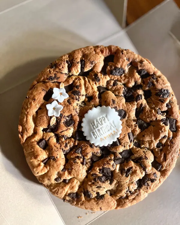 One of the most comforting items on my menu is this giant, buttery chocolate chunk cookie cake! It's best served slightly warm so the chocolate gets all melty and gooey.