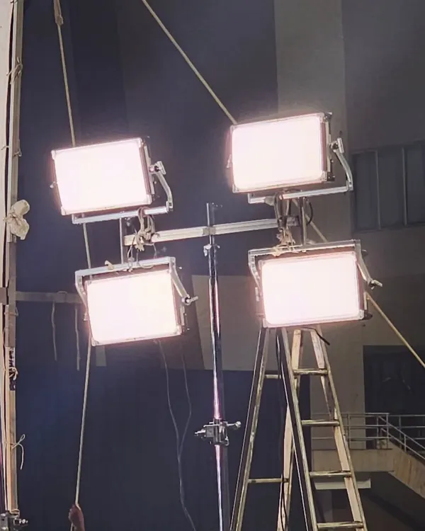 A rig of four Creamsource Vortex 8 panels mounted on a triple header and a Kupo crankovator stand. This is a quick and effective way to create a powerful, soft source that can be easily positioned on set.
