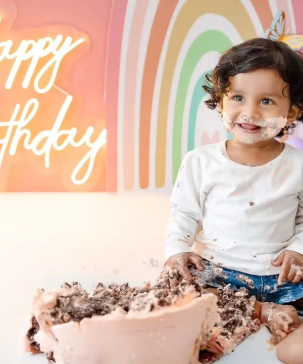 The pure joy of a first birthday cake smash! This little one is having the best time with her rainbow-themed celebration. I love capturing these messy, happy, and unforgettable moments.