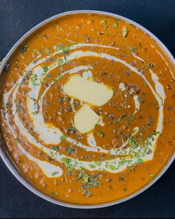 My Dal Makhni is a true crowd-pleaser, slow-cooked to perfection for a rich and creamy texture. It's topped with a dollop of butter and fresh cream, making it a must-have for any North Indian vegetarian catering menu in Gurgaon.