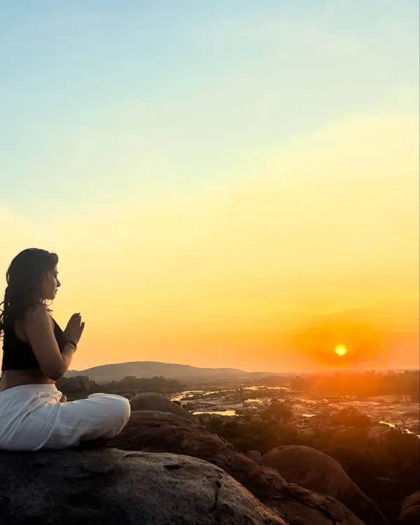 In this moment of sunrise meditation, I connect with the light outside and the Guru within. My practice is deeply tied to nature's rhythms, a source of immense gratitude and inspiration.
