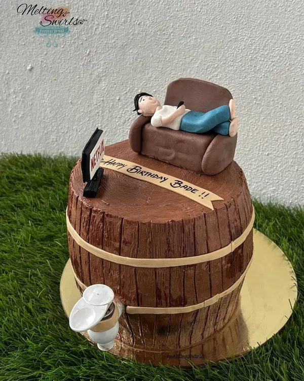We love a fun challenge, and this working barrel cake was an absolute blast to make. Shaped like a wooden barrel, it actually pours a drink from the tap, with a fun fondant figure relaxing on top.