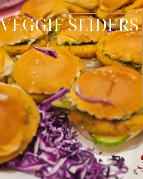 Our classic veggie sliders are a healthy and delightful bite. Packed with a fresh vegetable patty and served on a soft bun, they are a favorite appetizer for all ages.