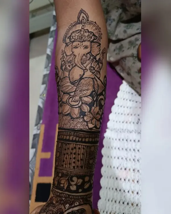 A beautifully detailed portrait of Lord Ganesha, the remover of obstacles. This design is perfect for bringing blessings to a new beginning, like a wedding or festival.
