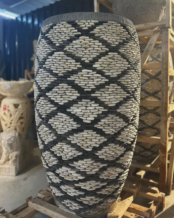 This majestic 4-foot tall pebble planter is a true work of art. Each pebble is carefully placed by Balinese artisans to create this stunning diamond pattern.