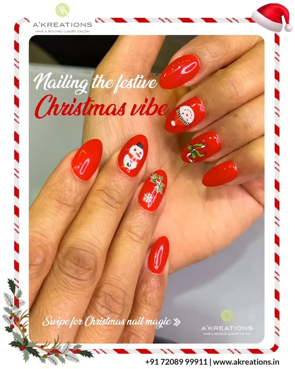 Get into the Christmas spirit with this cheerful bright red manicure, featuring adorable hand-painted snowmen and mistletoe accent nails.