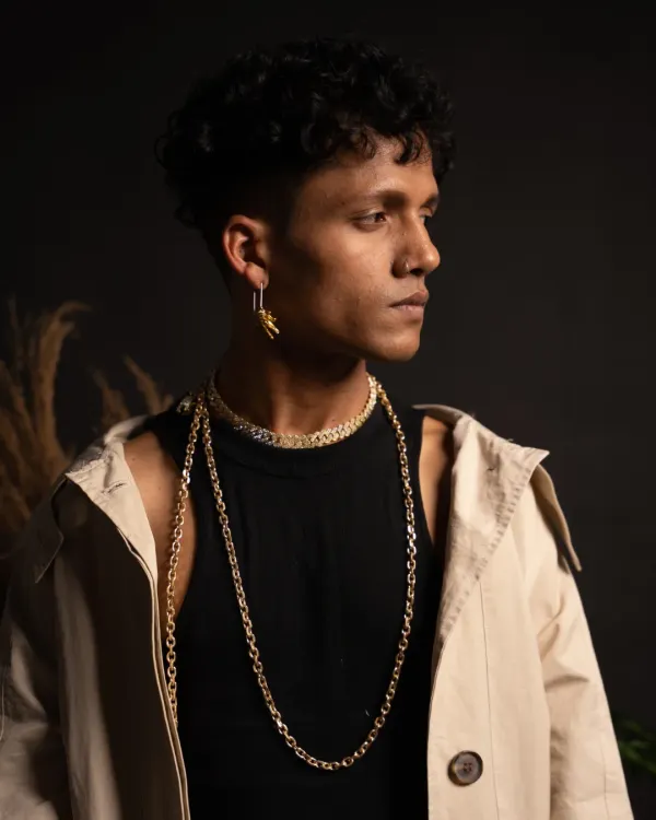 A professional studio portrait showing a confident and artistic look. Your style is part of your performance.