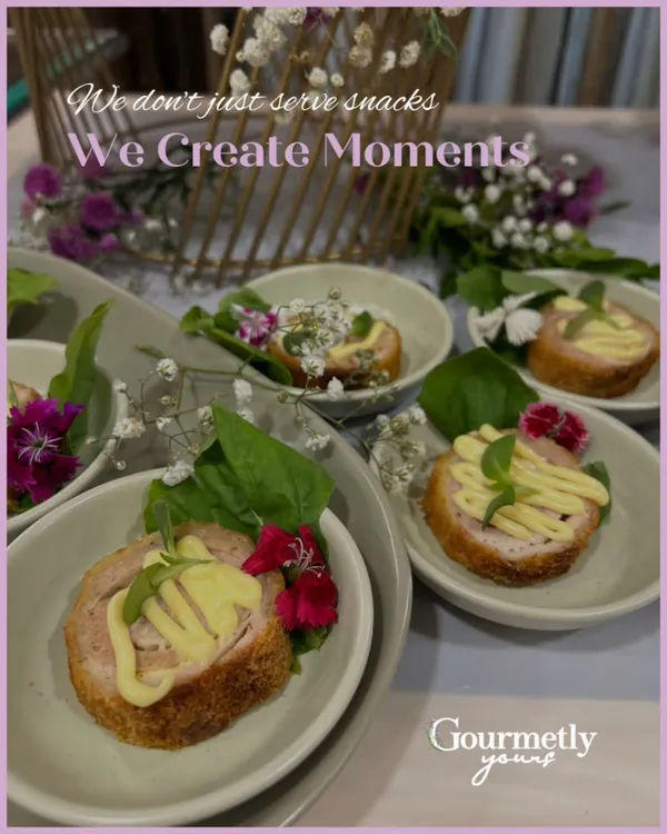 We don’t just serve snacks; we create moments. These individually plated appetizers, garnished with fresh basil and edible flowers, are designed to be as beautiful as they are delicious.