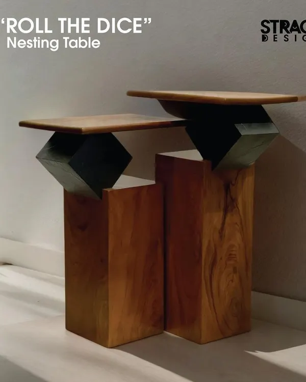 The "Roll the Dice" nesting tables are a perfect blend of modern design and natural elements. Made from solid teak wood with a stone veneer accent, these edgy tables can be used together or separately.