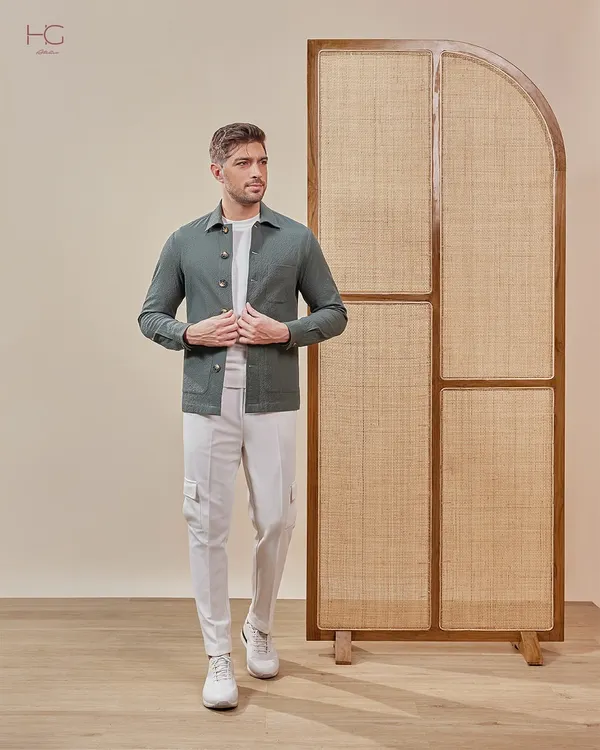 This olive green shacket is the perfect piece for a chill dinner or casual outing. I designed it to be an effortless layer that instantly elevates any look with its rich color and texture.