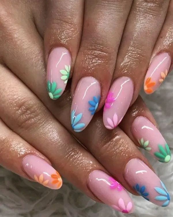 This detailed floral nail art shows my precision with fine lines and color blending. Each flower is hand-painted, creating a unique and artistic design on every nail.