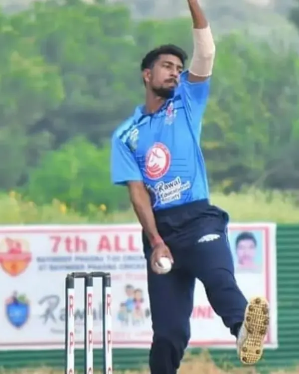 A fast bowler in full flow during a tournament match. Our coaching focuses on developing proper bowling action and technique to generate pace and accuracy.