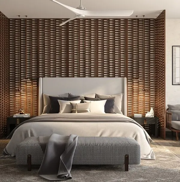 A serene master bedroom design centered around a large, woven wooden panel behind the bed. This centerpiece adds rich texture and warmth, demonstrating how a single, powerful element can define a space.