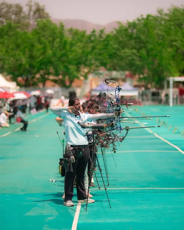A female archer takes aim at the National Women's Archery Tournament in Ambaji. A powerful shot from my collaboration with Gujarat Tourism.