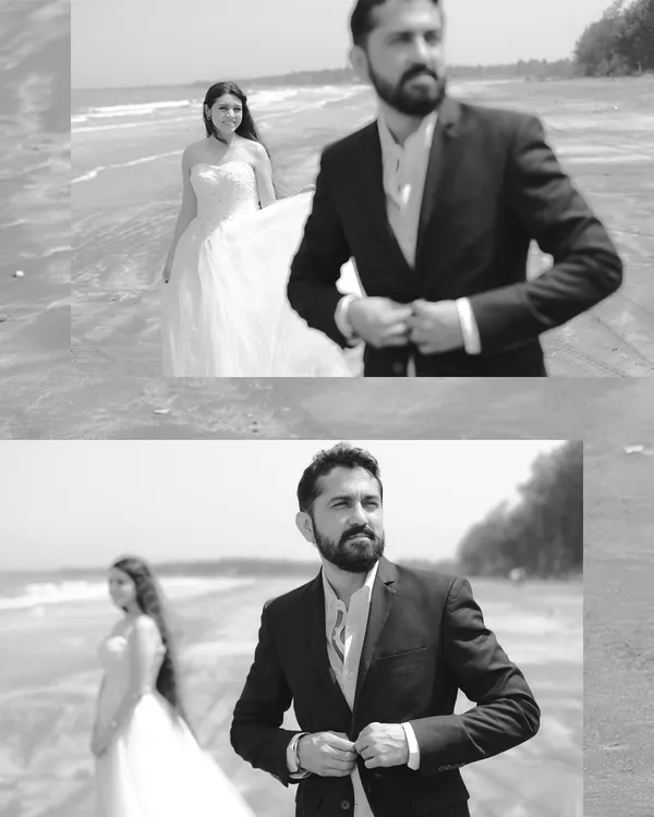 A black and white pre-wedding shoot on the beach. The composition creates a narrative, with the groom in the foreground and the bride approaching, telling a story of anticipation and love.