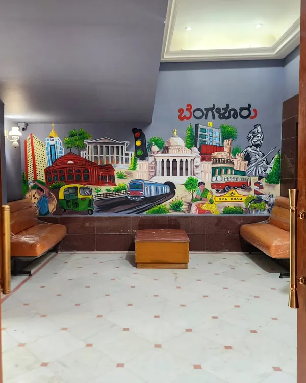 A wide shot of our Bengaluru collage mural in the waiting area for Luxar, creating an impressive welcome for visitors.