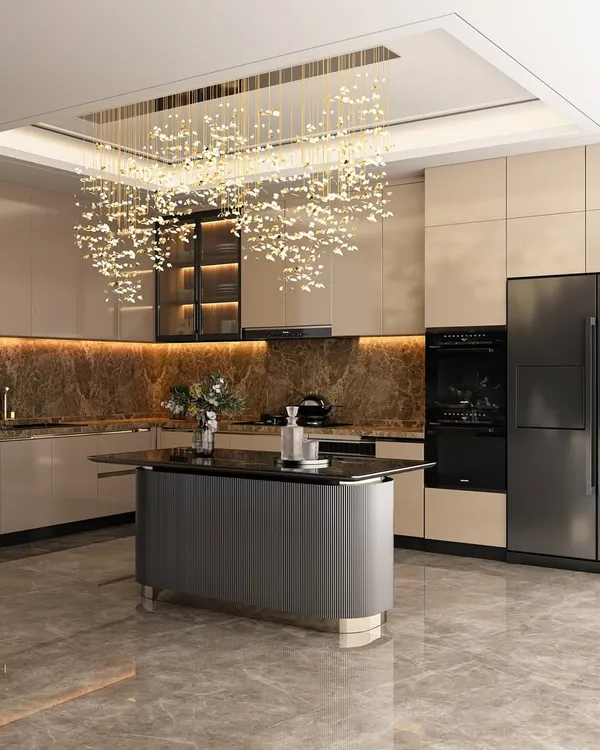 This kitchen is where elegance meets functionality. We used soft neutral cabinets, rich marble textures, and a stunning statement chandelier over the island to create a space that feels both luxurious and practical for everyday cooking.