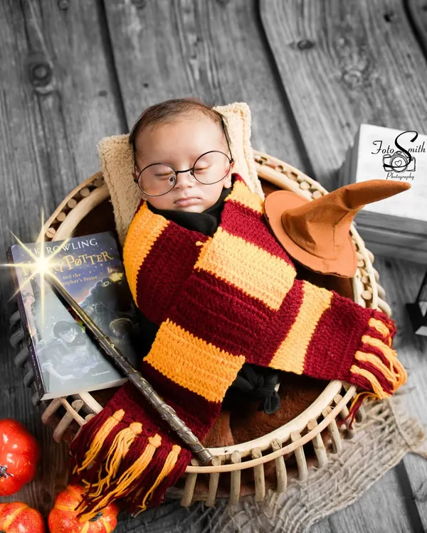 Our tiniest wizard is ready for Hogwarts. This Harry Potter theme is a favorite, complete with the iconic glasses, scarf, and a magic wand for a truly enchanting portrait.