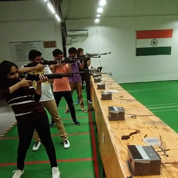 A full line of shooters taking aim with air rifles. I make sure everyone learns the correct posture and handling to get the most out of their 20 rounds.