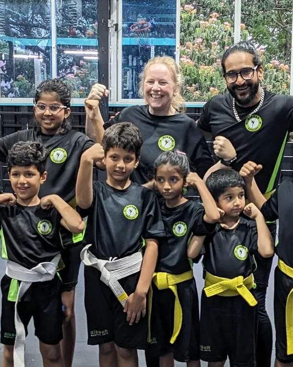 Little fighters, big dreams. This is our squad of young warriors after another great class. I build a community where friendships are forged through hard work and fun.