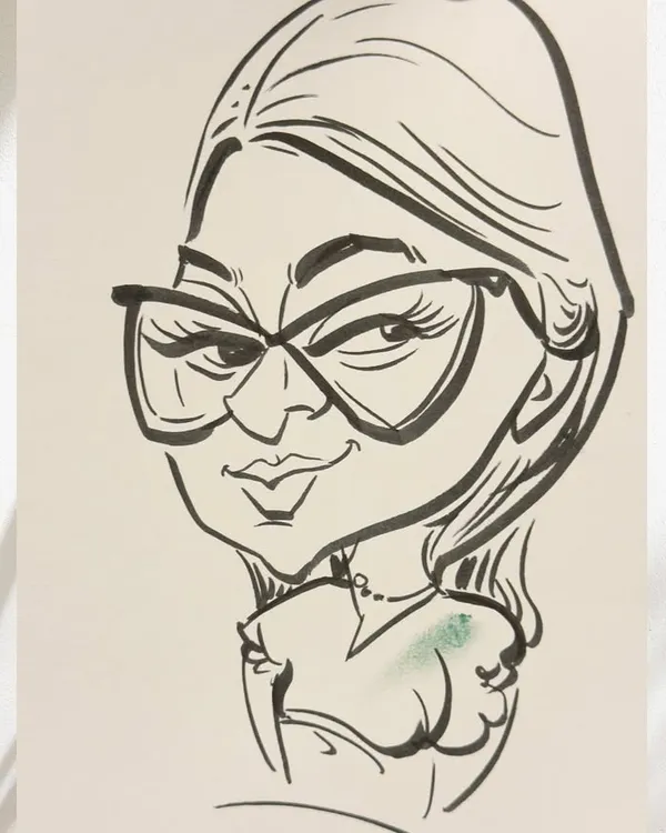 A close-up of a finished black and white sketch. I use bold, confident lines to capture the subject's expression and personality, especially their stylish glasses.