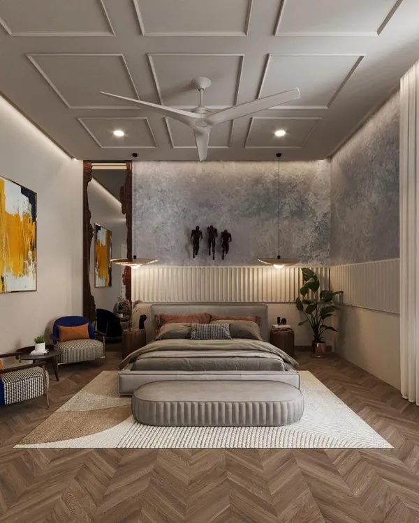 I designed this bedroom to be a masterpiece of modern elegance. The coffered ceiling adds architectural depth, while the textured accent wall, herringbone wood flooring, and curated art create a layered and sophisticated look.