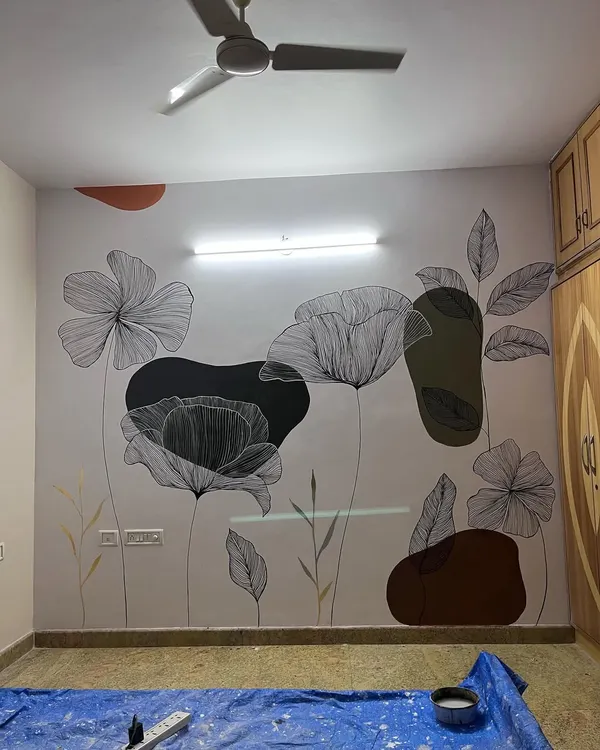 This bohemian foliage mural is a milestone piece for me. The combination of black line art flowers with abstract shapes in earthy tones creates a balanced and artistic composition.