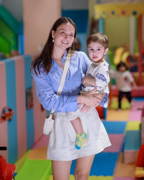 A beautiful moment between a mother and her son. Our play area is a backdrop for creating cherished family memories.