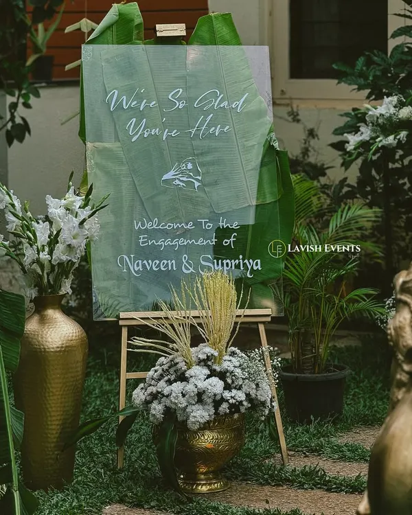 A classic and elegant welcome sign for a vintage-themed engagement party.