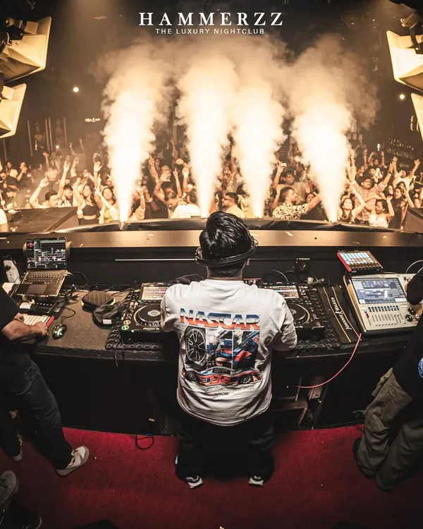 This is the moment I live for. Looking out from the decks at a sea of people, united by the beat, with the CO2 cannons firing. This is the energy I bring to every nightclub event.