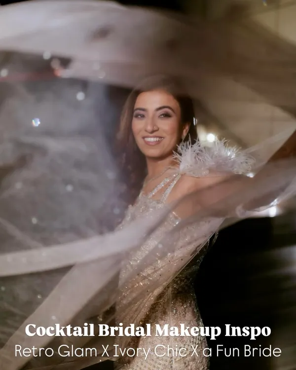 This is how you do cocktail glam. Retro waves, soft color shimmer, and an ivory cape moment that turns every head in the room. This look is glamorous yet effortless.