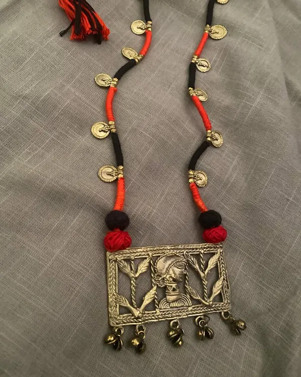 This beautiful Dokhra neckpiece was a collaboration with another artist. I used my collection of cords and beads to assemble this piece, and I love how the final design turned out.